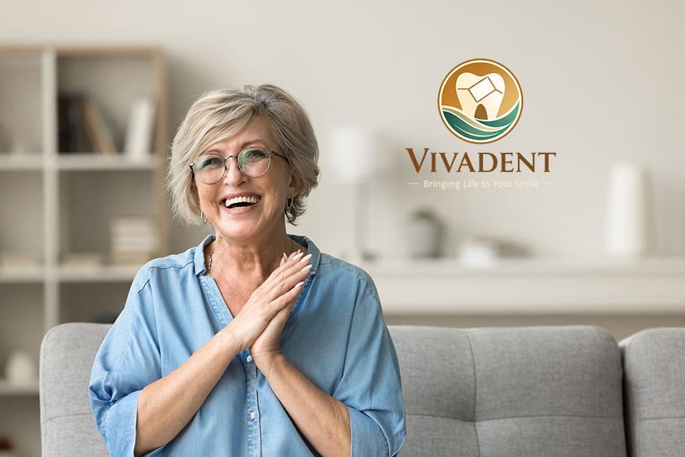 Woman smiling after a visit to Vivadent Dental Studio